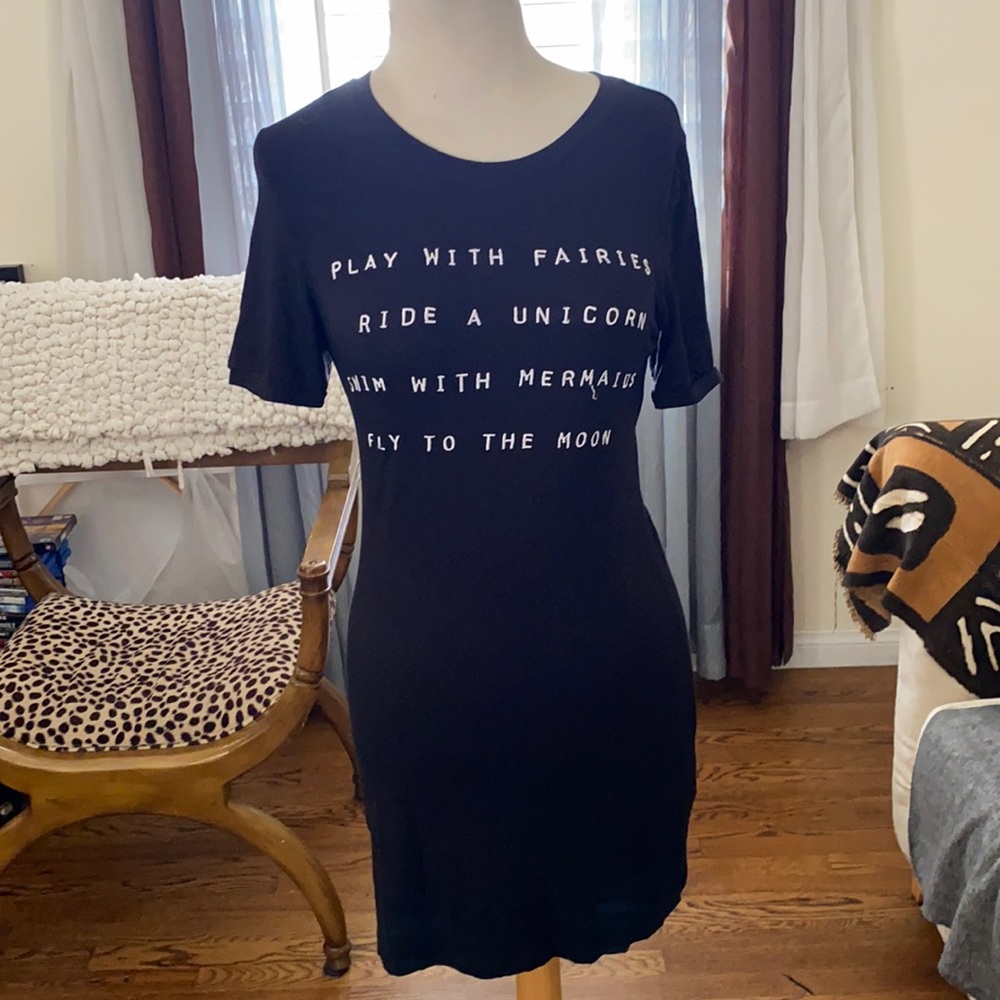 Black stretchy dress with writing on chest